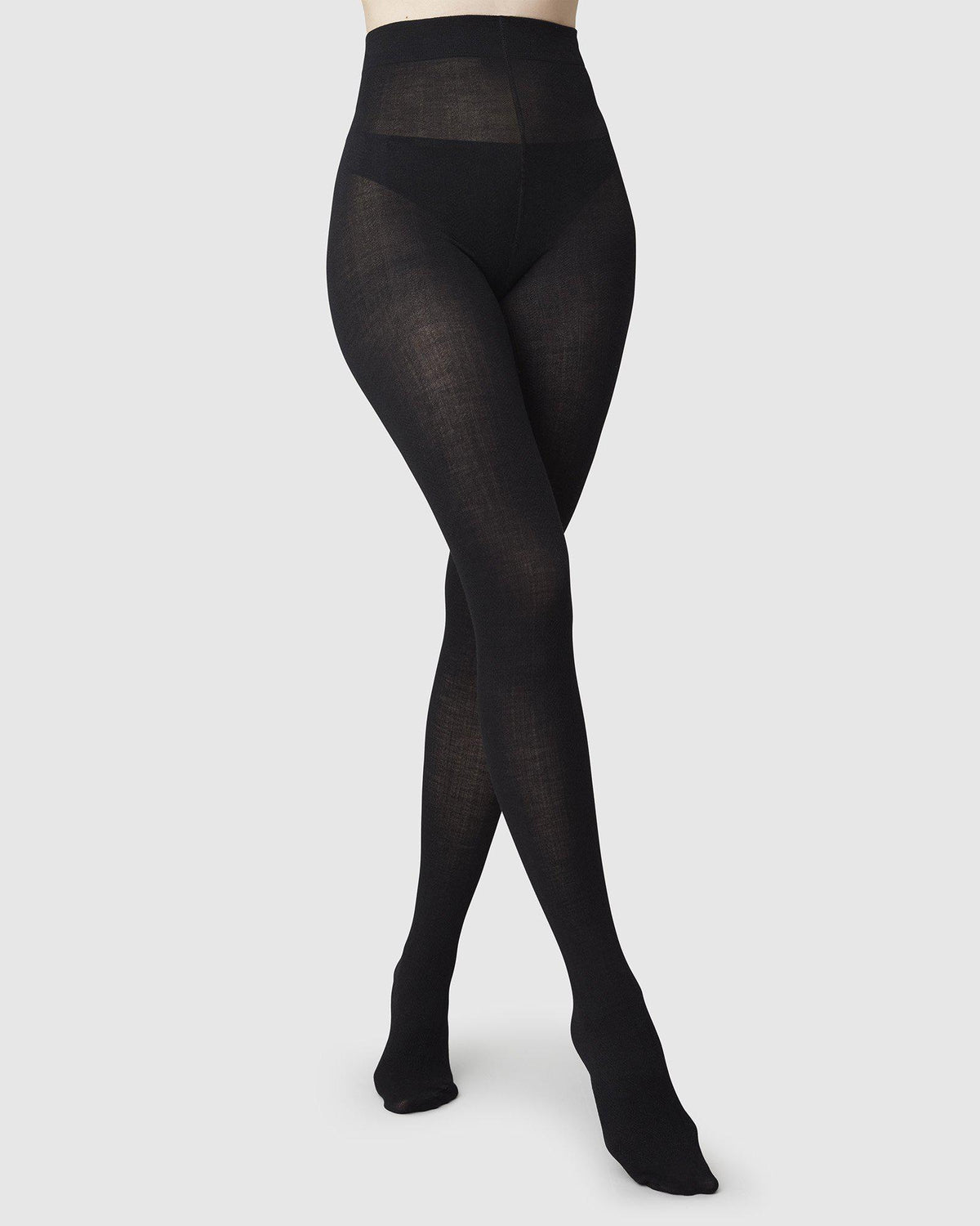 Collants en mélange de laine certifiée et matières recyclées | noir "ylva organic wool fishbone"