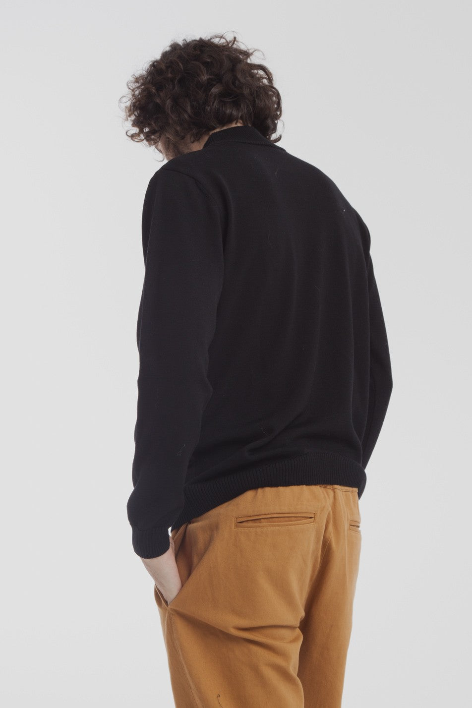 Pull col roulé noir en laine mérinos