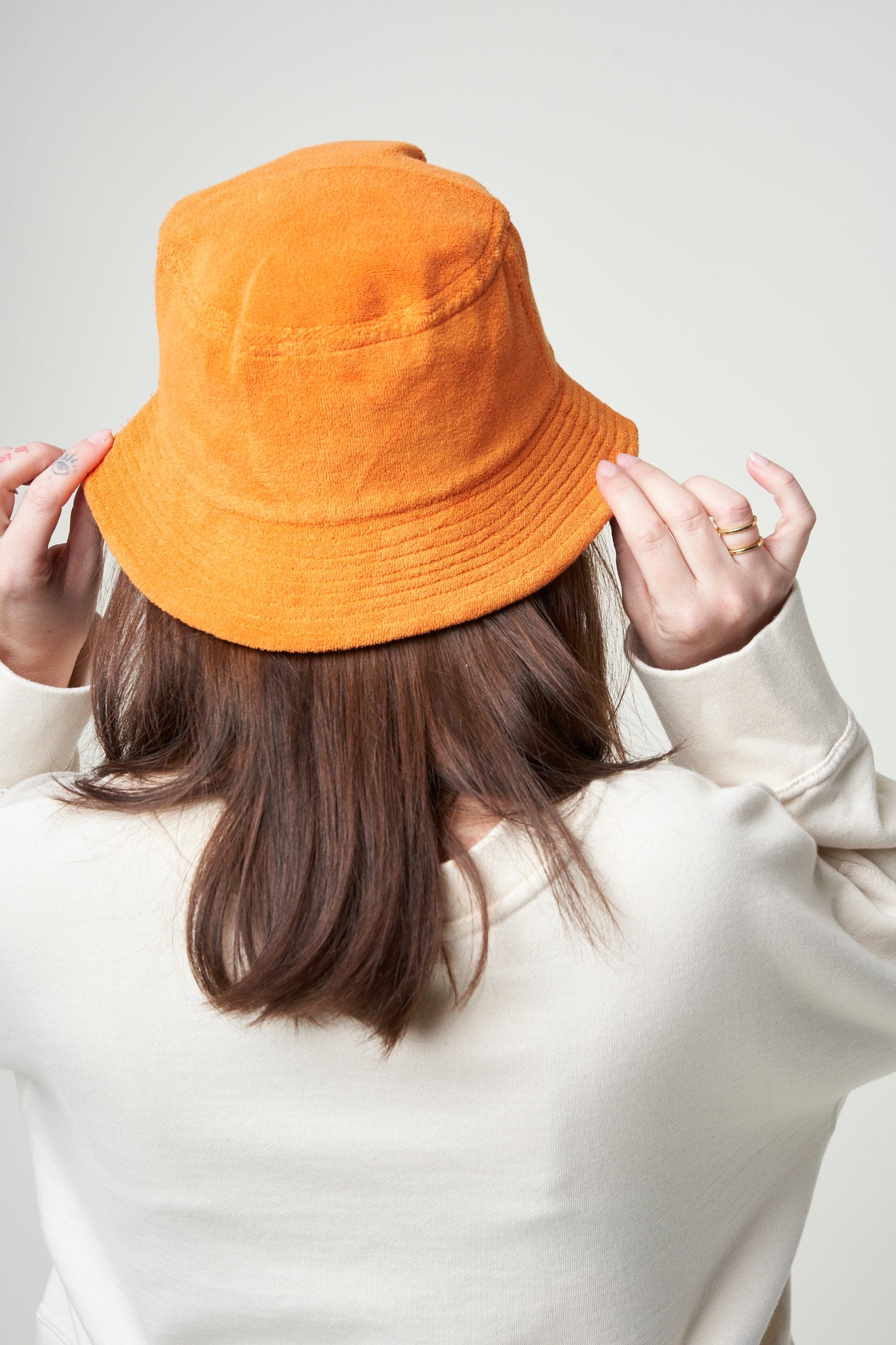 Bob éponge orange en coton bio et matière recyclée - terry bucket hat russet orange