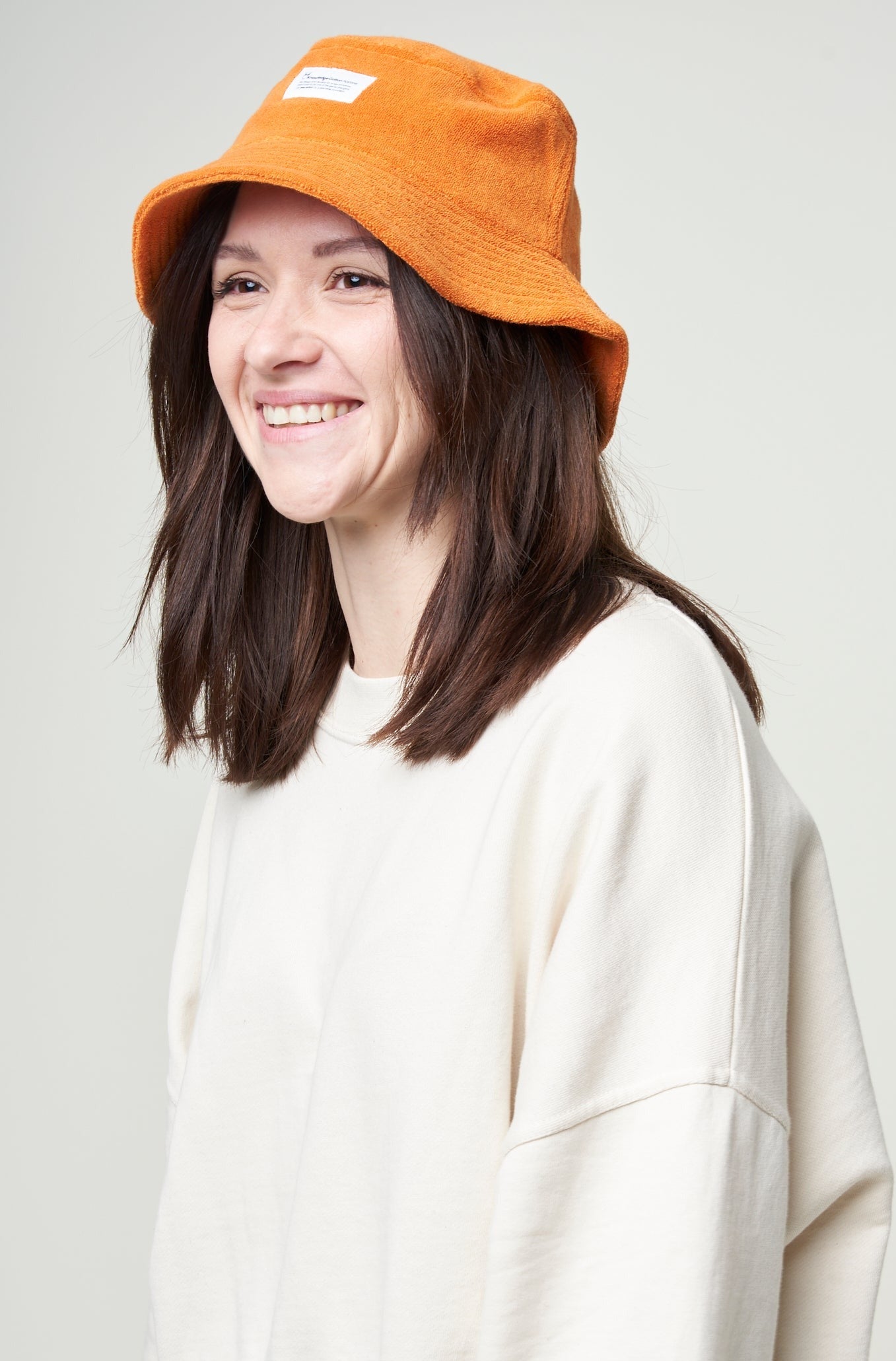 Bob éponge orange en coton bio et matière recyclée - terry bucket hat russet orange