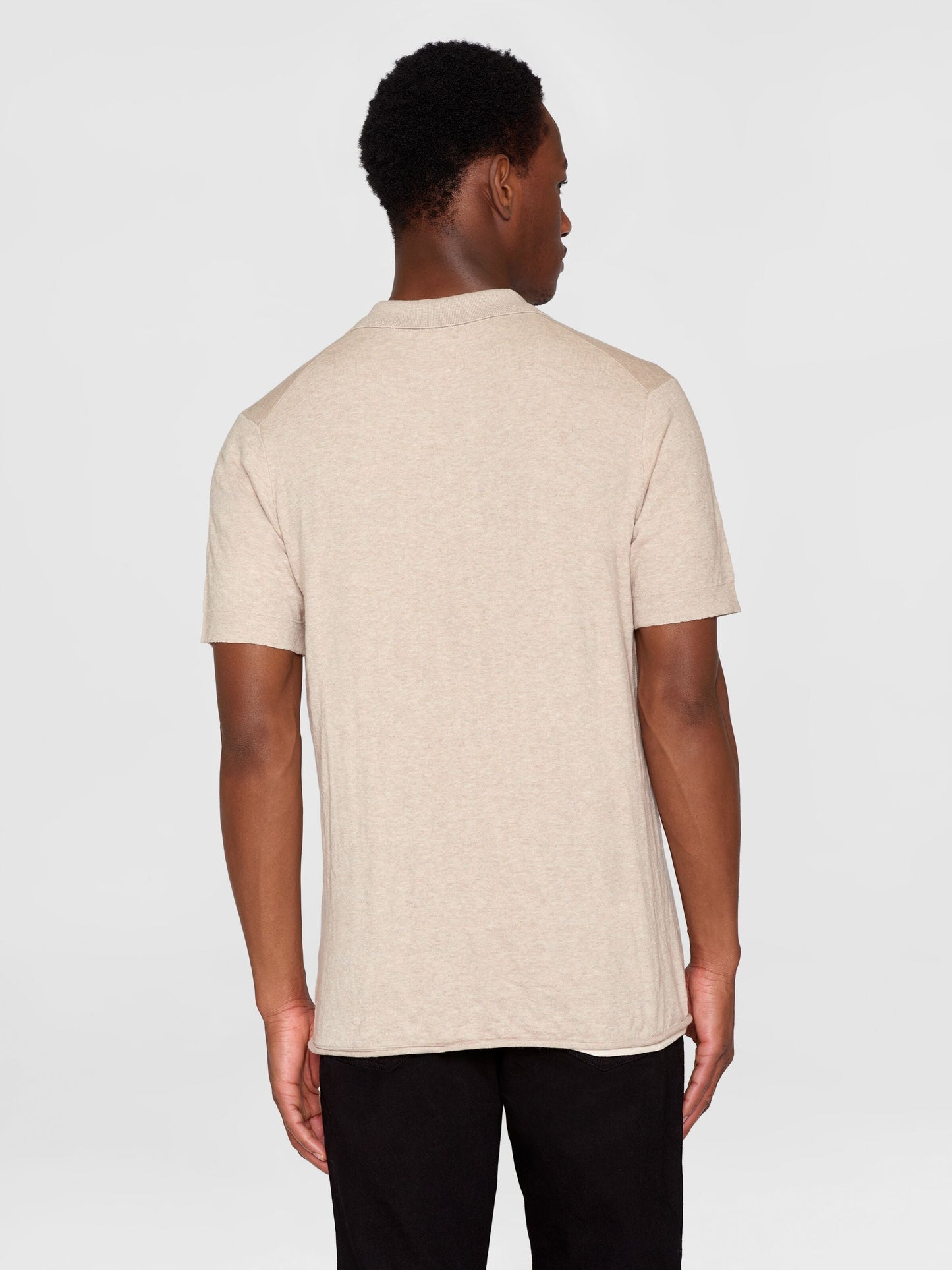 Polo en coton bio et en laine | écru “regular double layer knitted short sleeved polo nature melange”