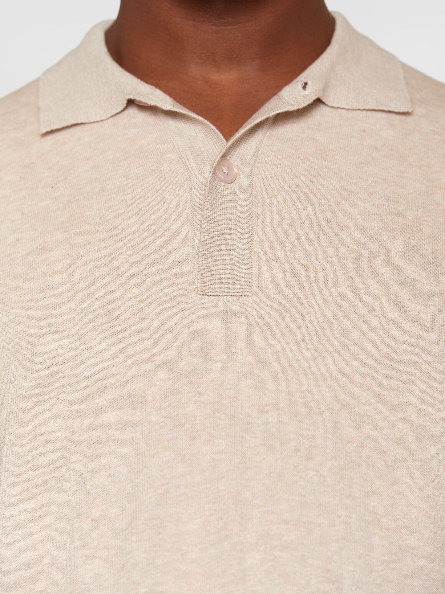 Polo en coton bio et en laine | écru “regular double layer knitted short sleeved polo nature melange”