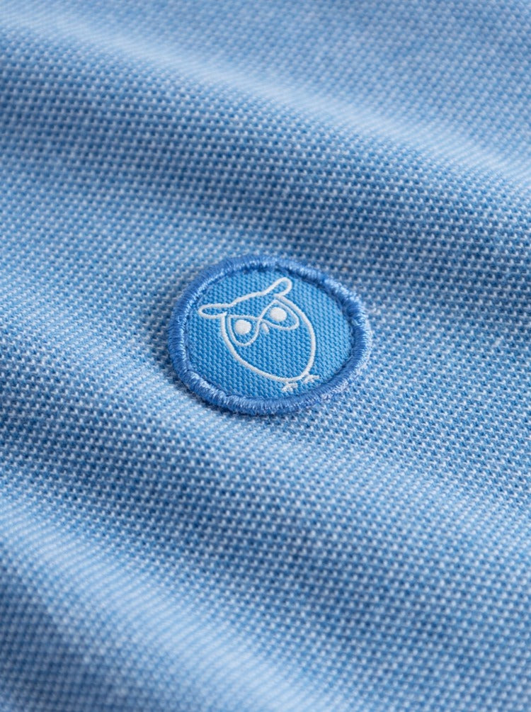 Polo bleu ciel chiné en coton bio - yarn dyed badge polo campanula