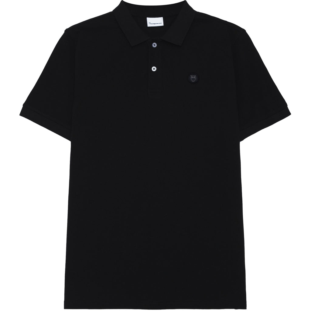 Polo brodé en coton bio | noir "toke basic badge polo black jet"