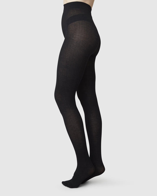 Collants en mélange de laine certifiée et matières recyclées | noir "ylva organic wool fishbone"