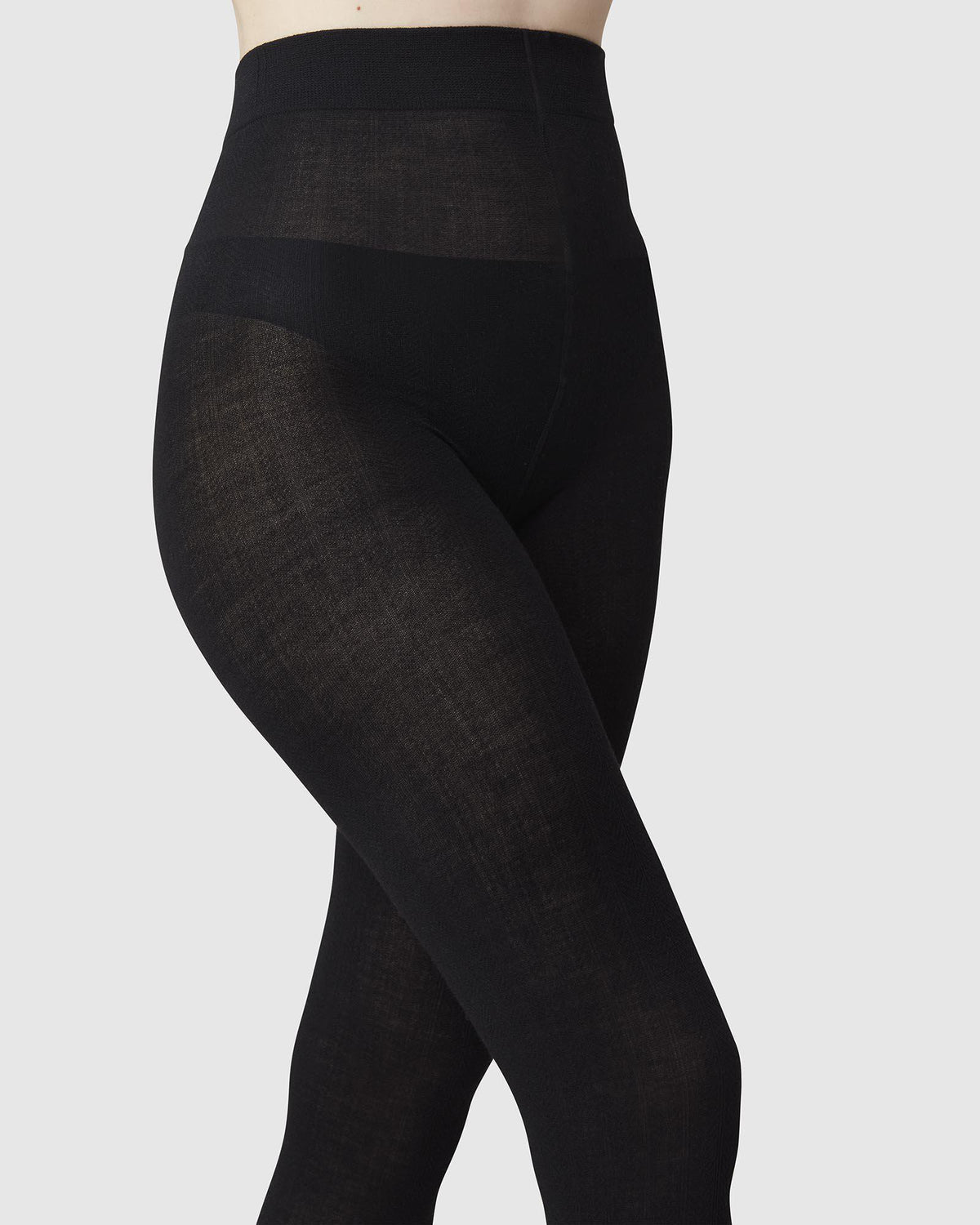Collants en mélange de laine certifiée et matières recyclées | noir "ylva organic wool fishbone"