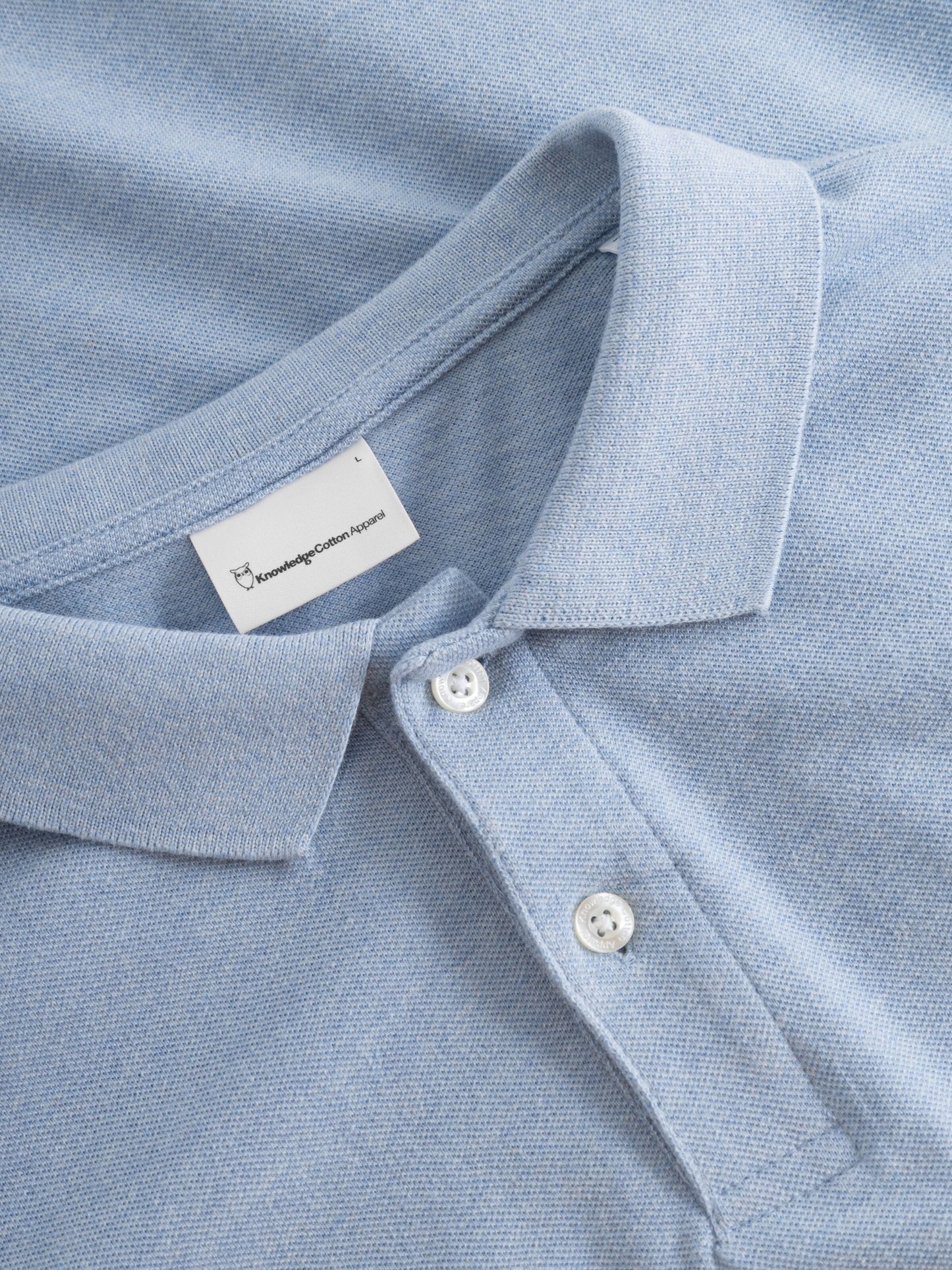 Polo en coton bio | Bleu clair "toke basic badge polo sky way melange"