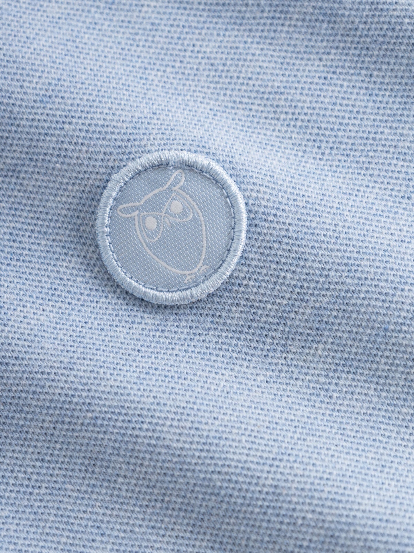 Polo en coton bio | Bleu clair "toke basic badge polo sky way melange"