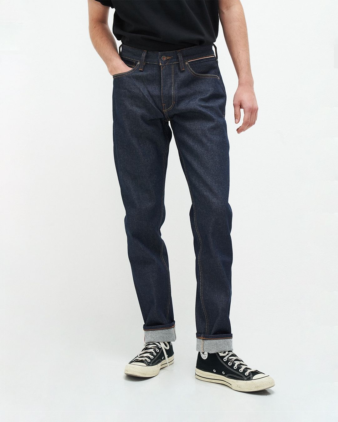 Jean droit fuselé en coton recyclé | bleu brut "jim regular slim orange selvedge recycled raw"