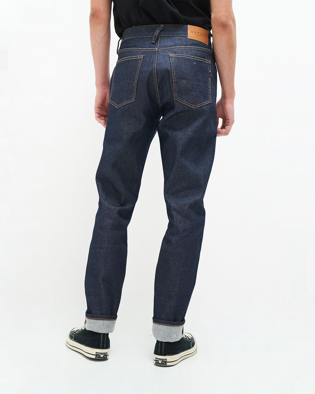 Jean droit fuselé en coton recyclé | bleu brut "jim regular slim orange selvedge recycled raw"