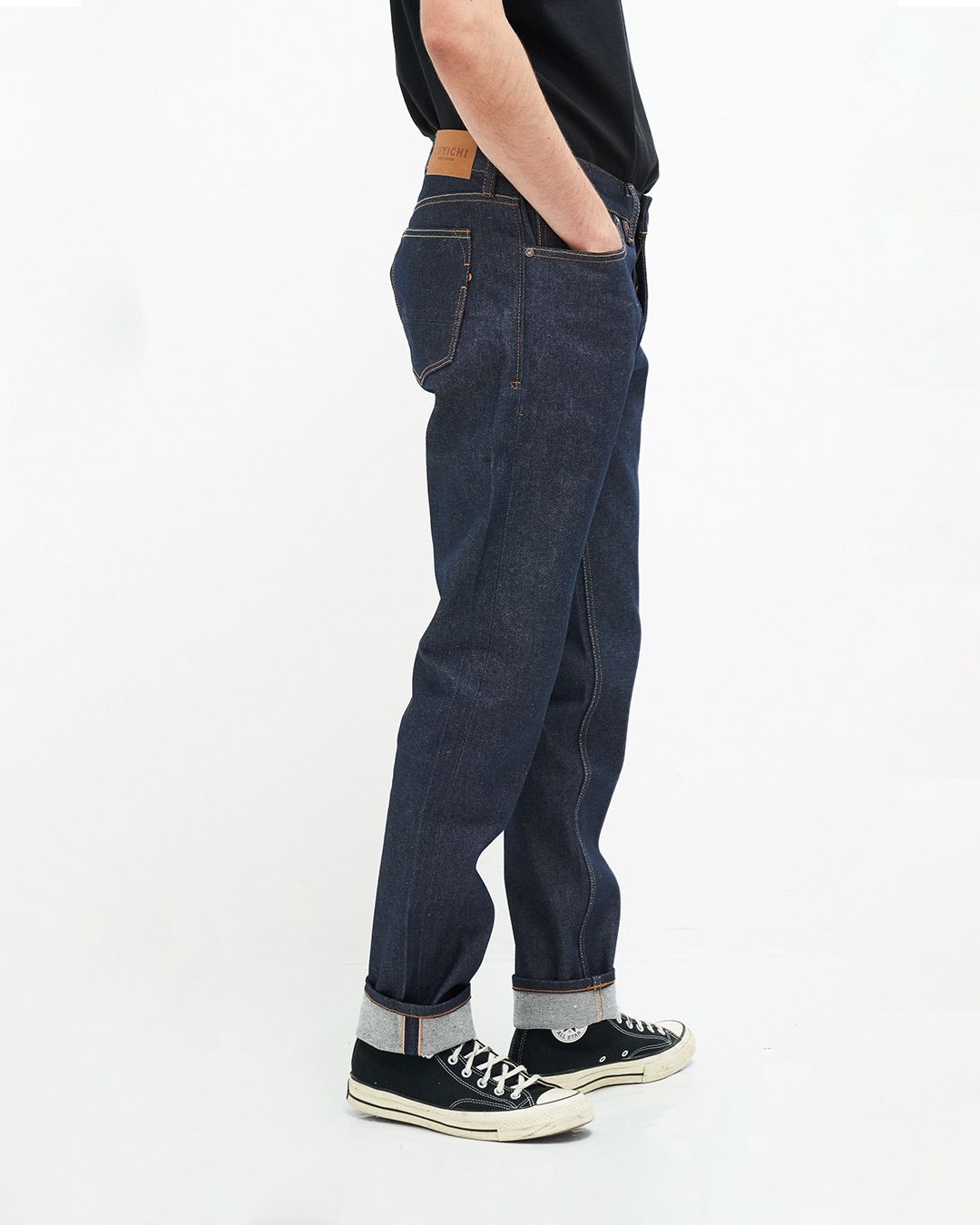 Jean droit fuselé en coton recyclé | bleu brut "jim regular slim orange selvedge recycled raw"