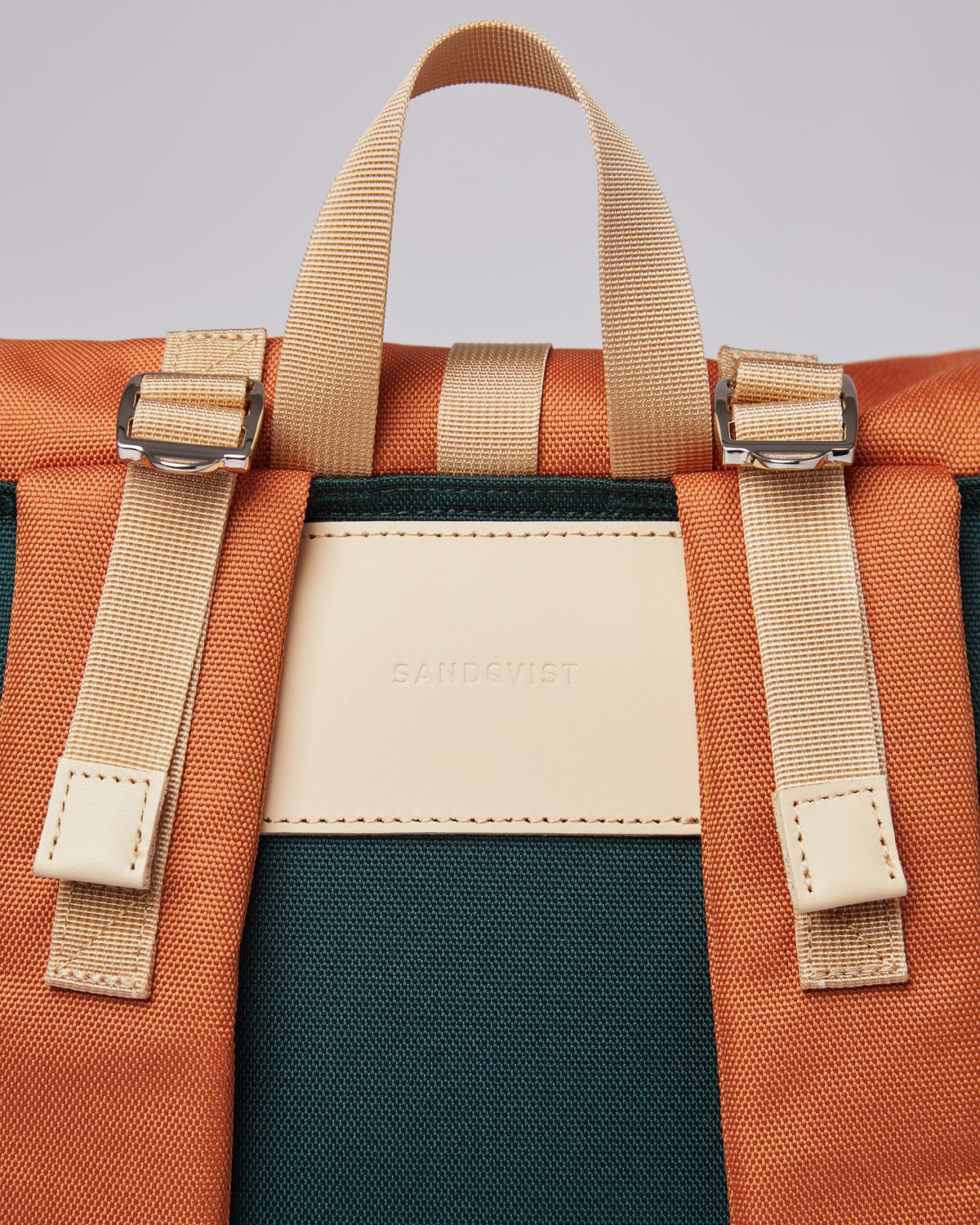 Sac à dos rolltop en matière recyclée | Vert et orange "bernt multi dark green/orange"