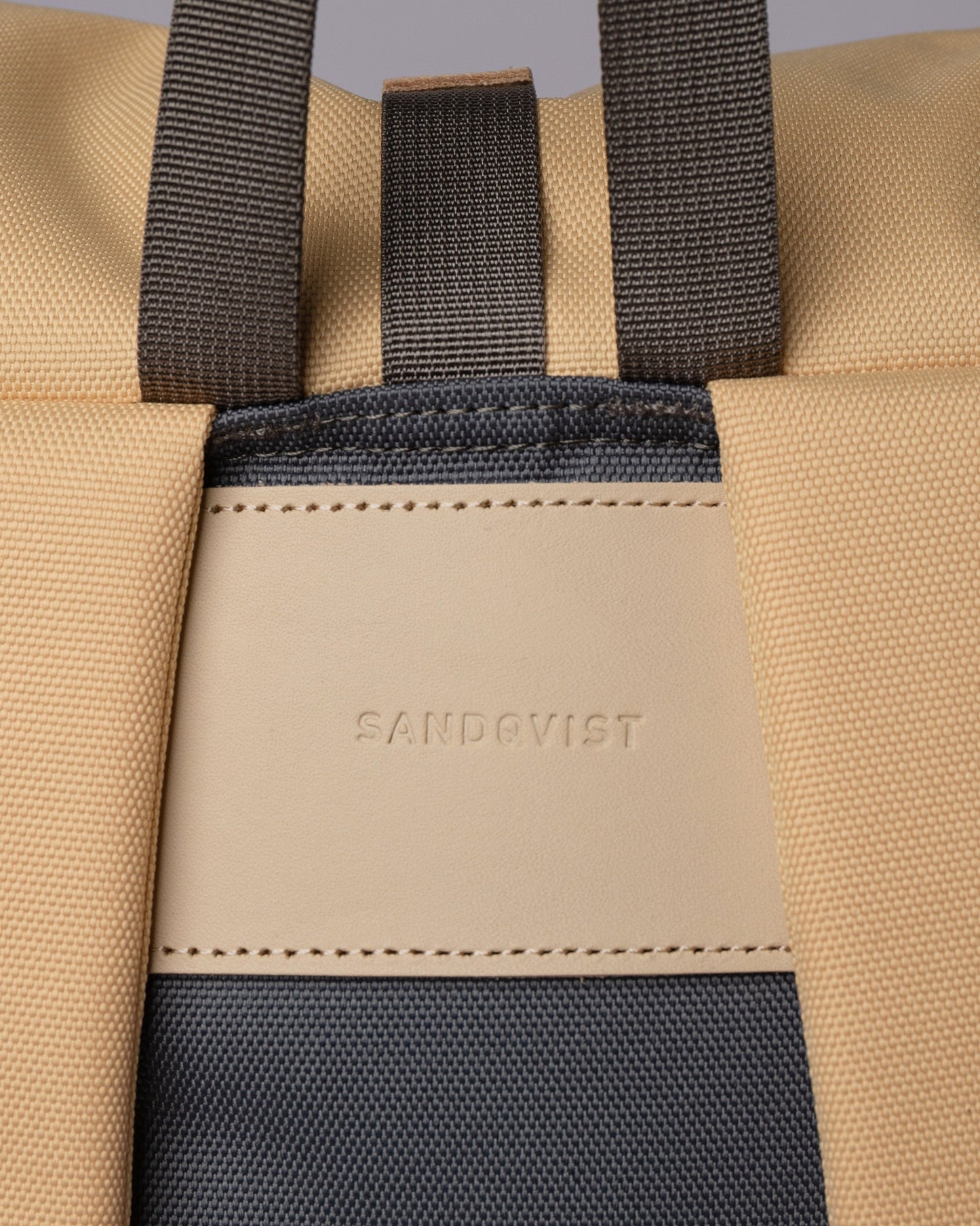 Sac à dos rolltop en matière recyclée | Gris et jaune "ilon multi wheat"