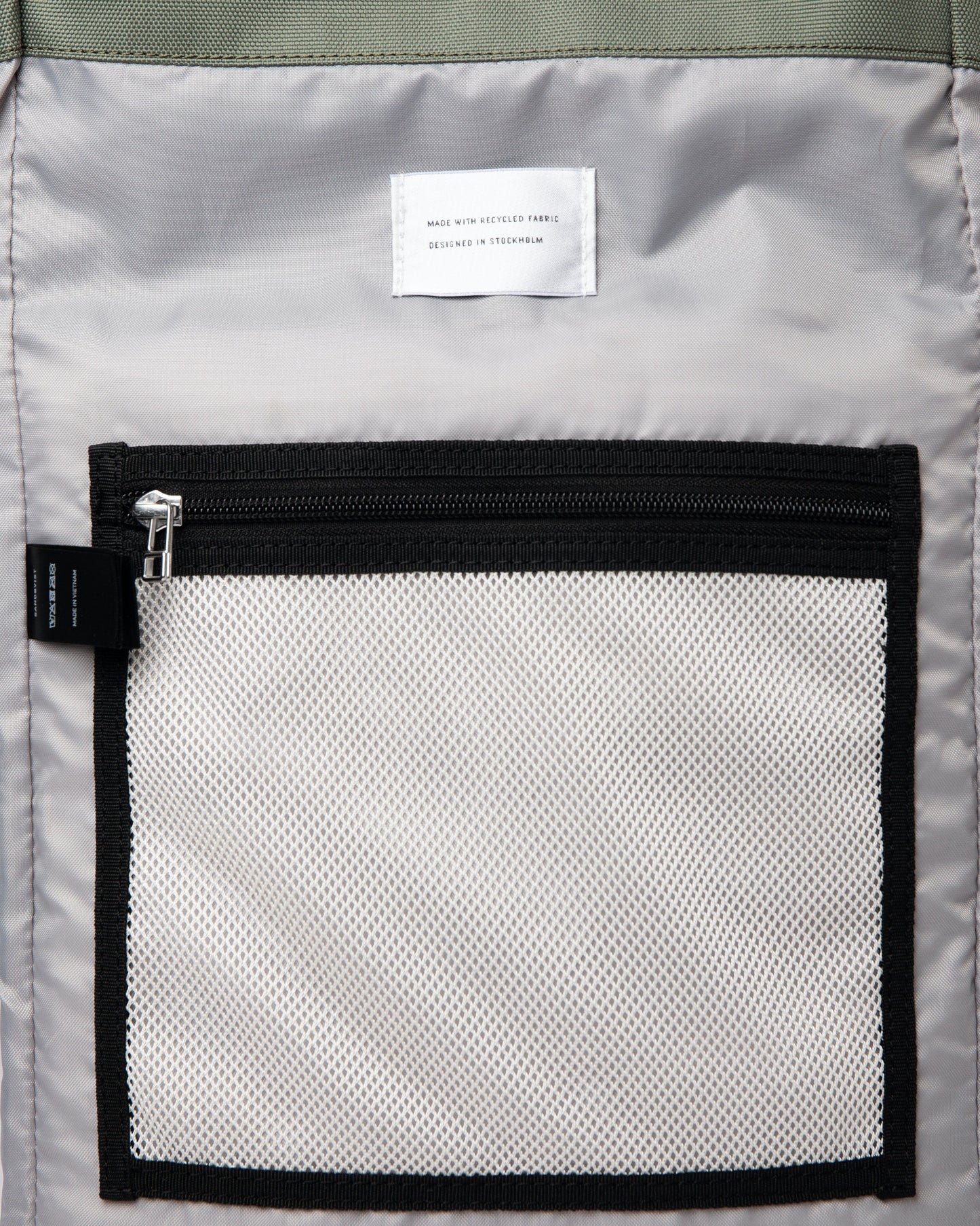 Sac à dos rolltop en matière recyclée | Noir et vert "ilon multi clover green"