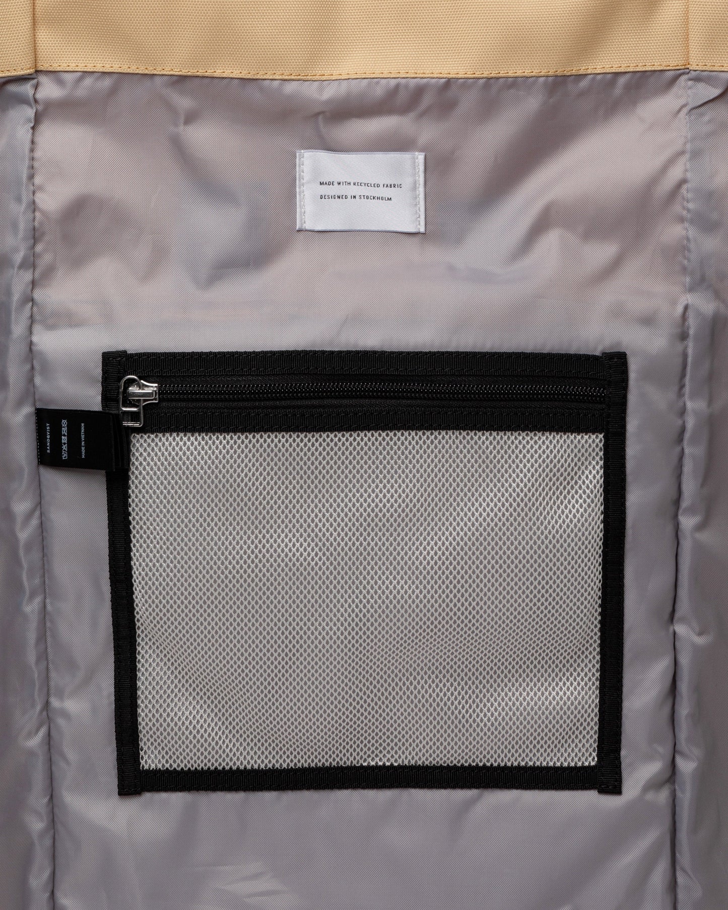 Sac à dos rolltop en matière recyclée | Gris et jaune "bernt multi wheat"