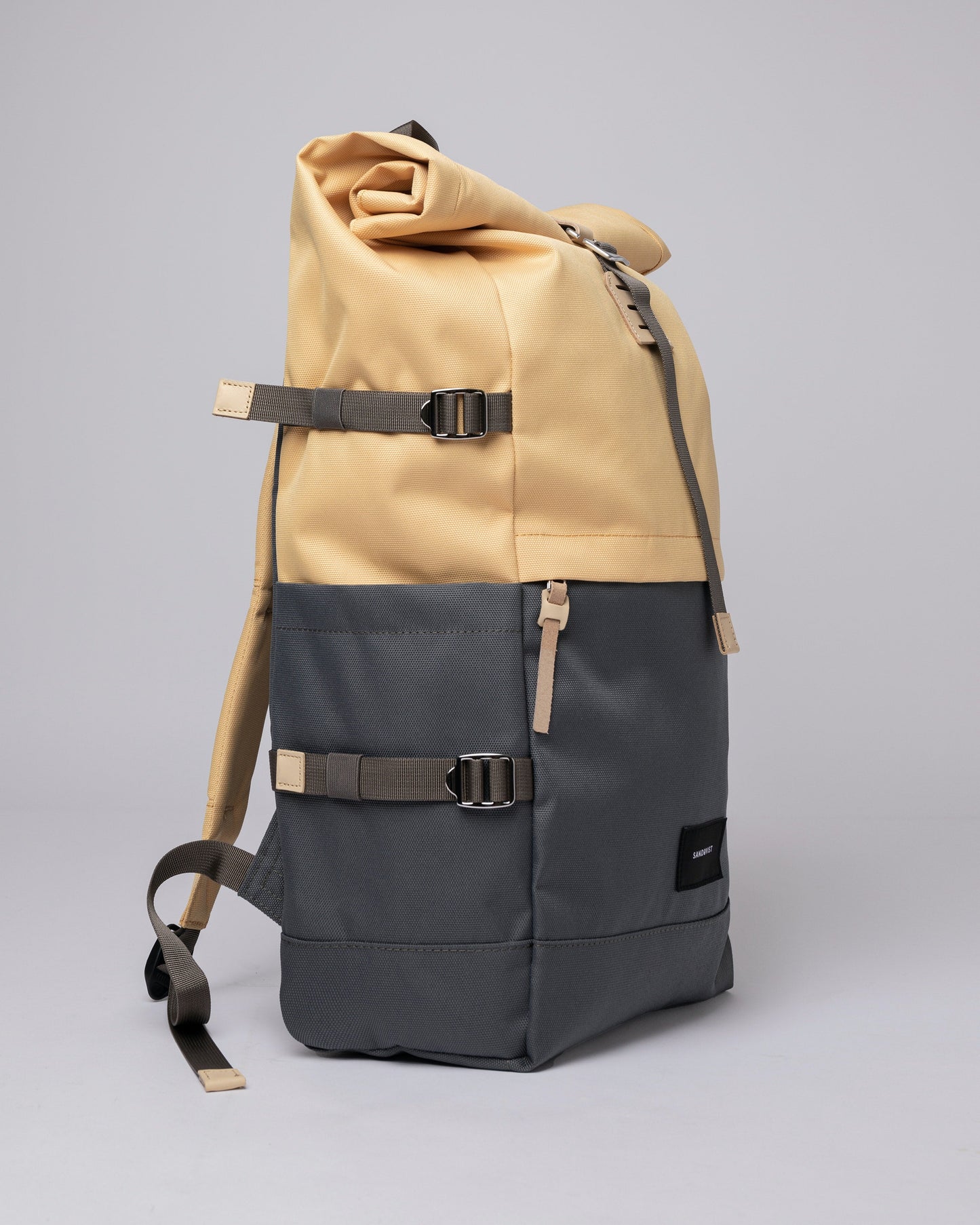 Sac à dos rolltop en matière recyclée | Gris et jaune "bernt multi wheat"