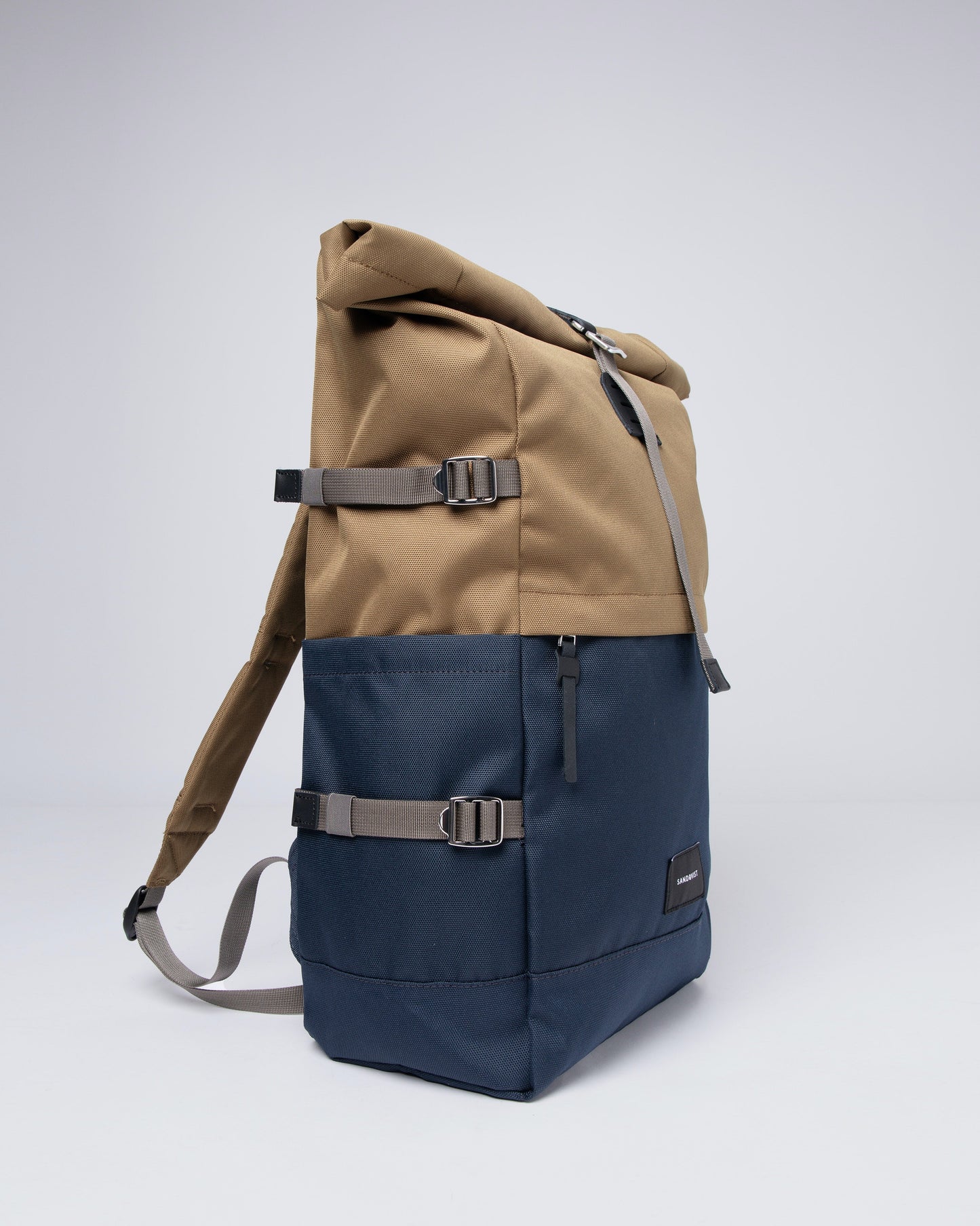 Sac à dos rolltop en matière recyclée | bleu et marron "bernt multi marsh yellow"