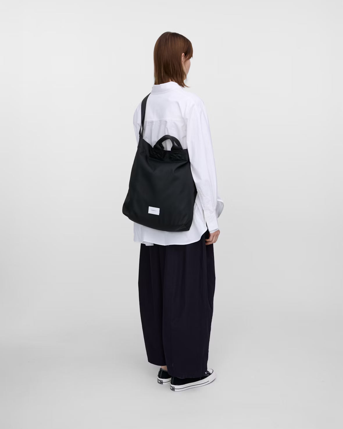 Sac tote/bandoulière 19L en matière recyclée | noir "ground shopper bag - black"