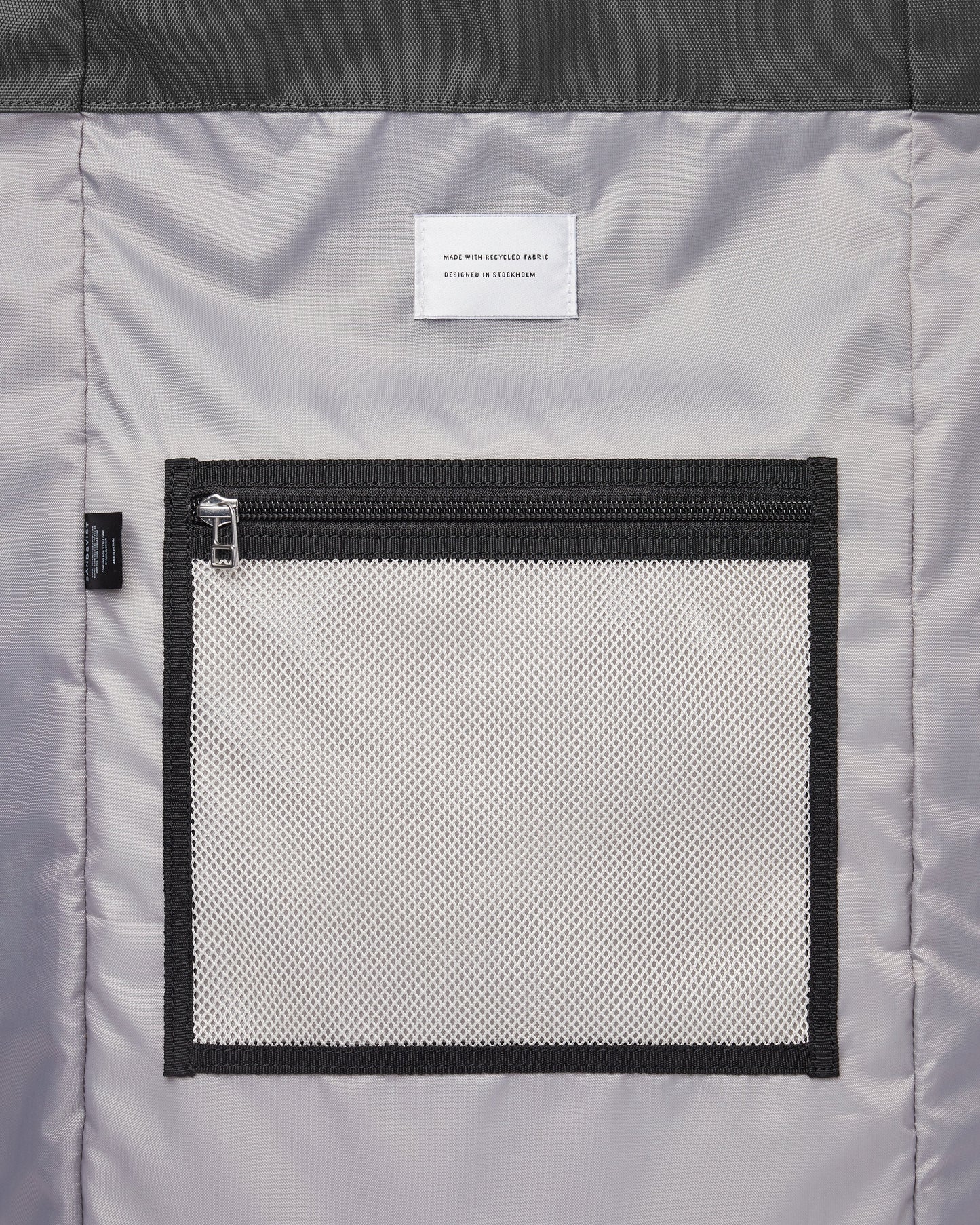 Sac à dos rolltop en matière recyclée | Noir et gris "bernt multi dark"