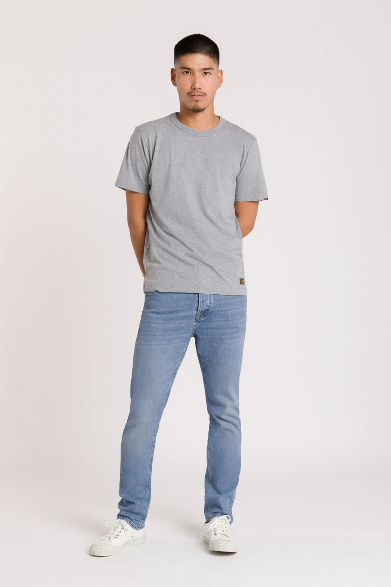 Jean slim en coton bio et recyclé | Bleu délavé "john sander light worn"
