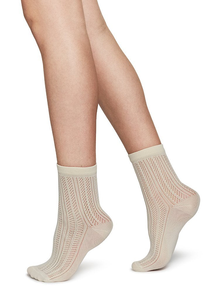 Chaussettes hautes beiges à motifs en polyamide recyclé - Klara