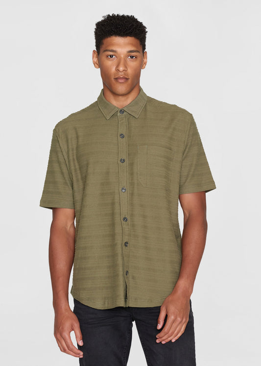 Chemise en coton biologique | vert "Loose short sleeve cotton solid striped jersey shirt gots/vegan - 1068 burned olive"