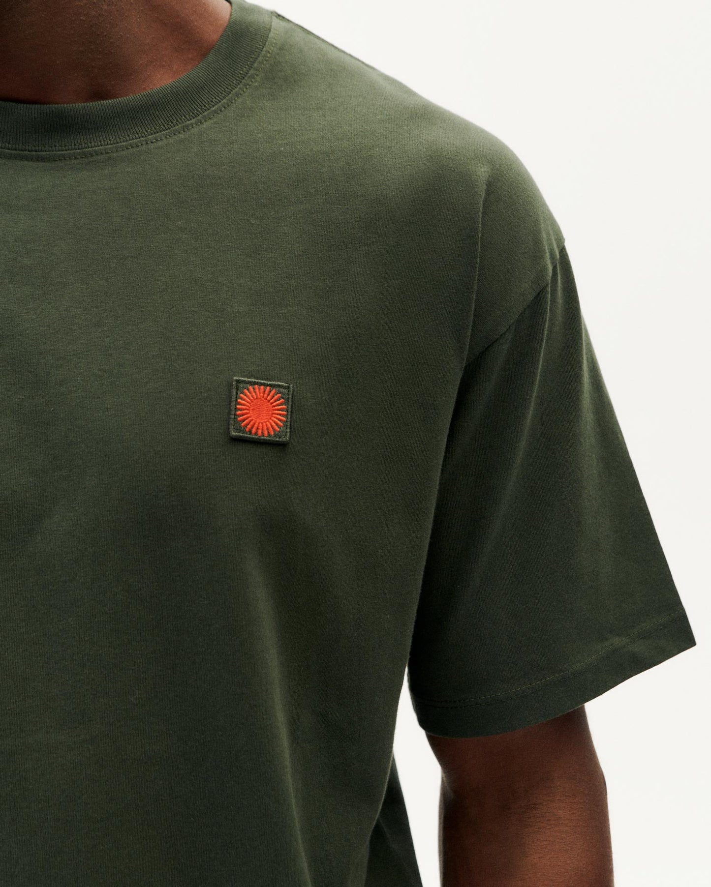 T-shirt imprimé en coton bio | vert "bottle green face sol t-shirt"