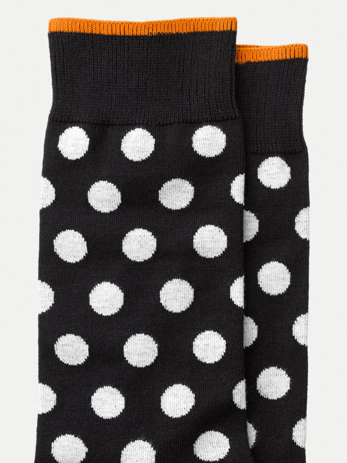 Chaussettes hautes à pois noires en coton bio - Olsson