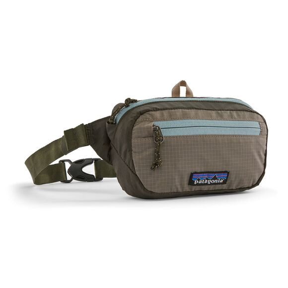 Banane en matière recyclée | vert "ultralight black hole mini hip pack pine needle green"