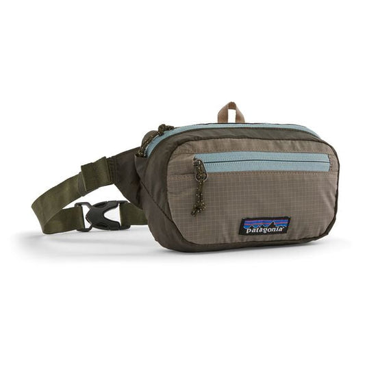 Banane en matière recyclée | vert "ultralight black hole mini hip pack pine needle green"