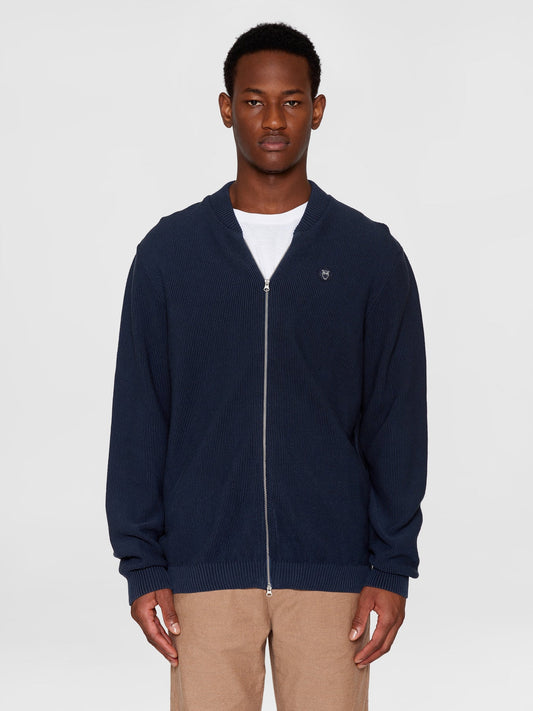 Gilet zippé en coton bio | Marine "pique badge knit o-neck total eclipse"
