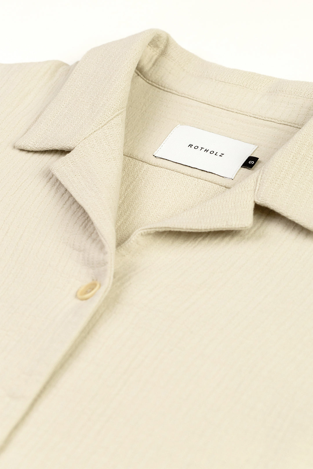 Chemise courte en coton bio | écru "cropped bowling shirt washed sand"
