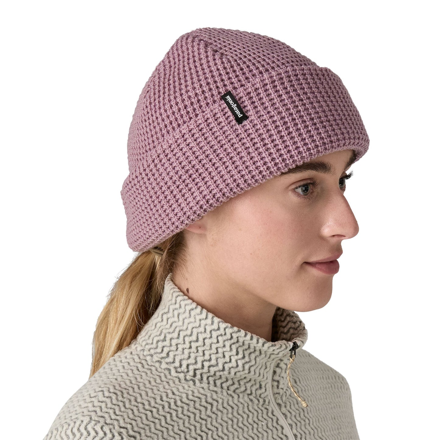Bonnet à rabat en matière recyclée | rose "snowdrifter beanie stormy mauve"