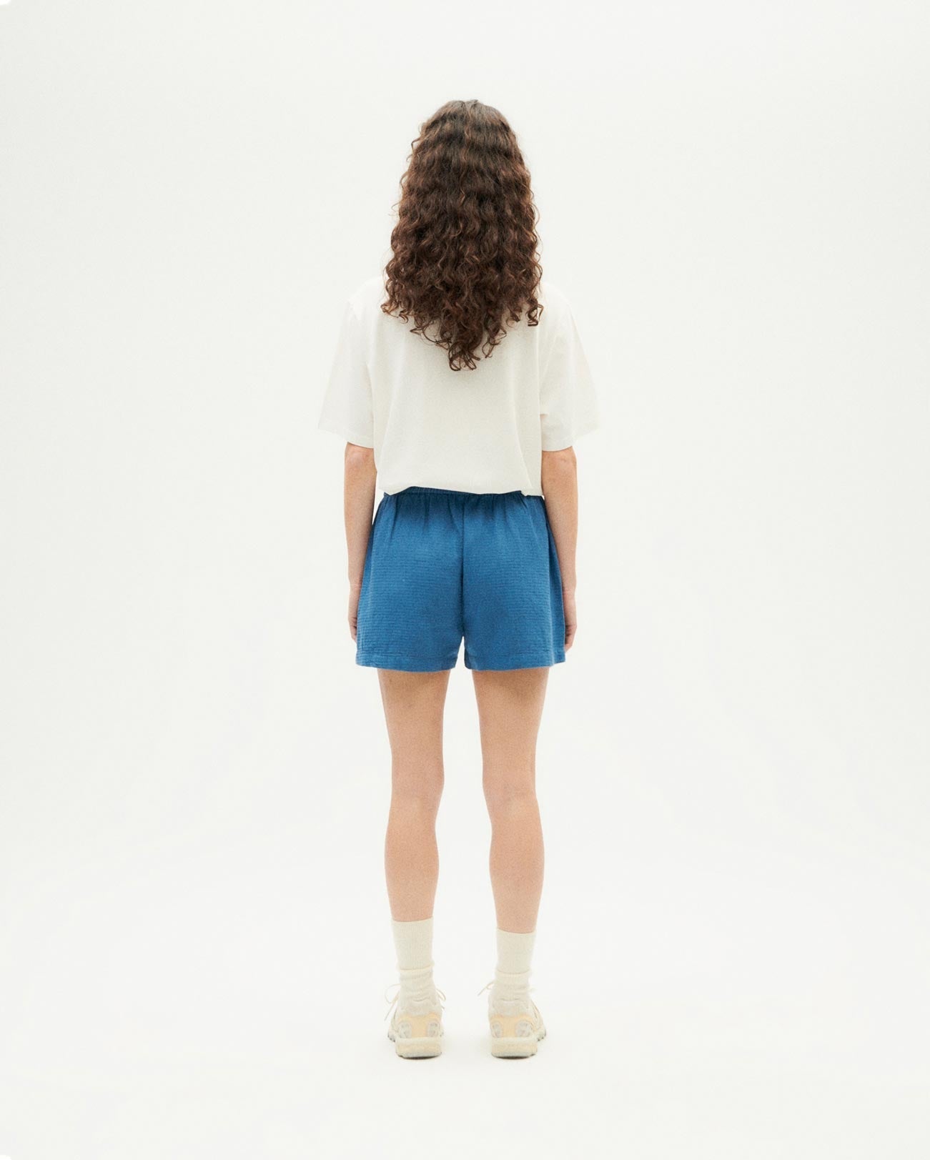 Short texturé en coton bio | Bleu "dark heritage loop geranio shorts"