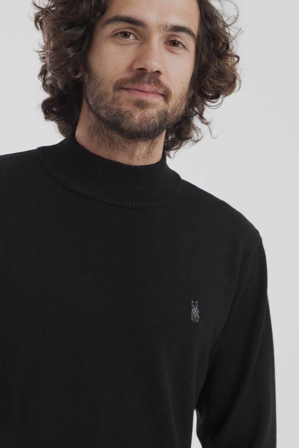 Pull col roulé noir en laine mérinos