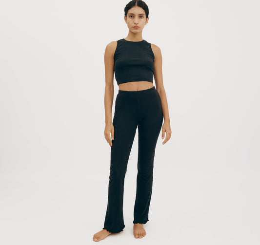 Legging côtelé en coton bio | Noir "core bold rib flare leggings black"