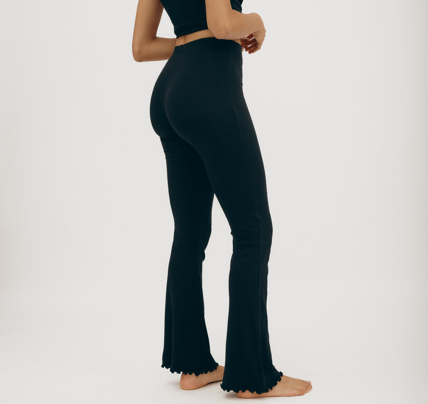 Legging côtelé en coton bio | Noir "core bold rib flare leggings black"